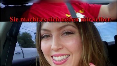 Sie macht es sich neben mir im Auto selber