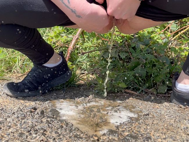 Spritziger Public Piss in der Sonne